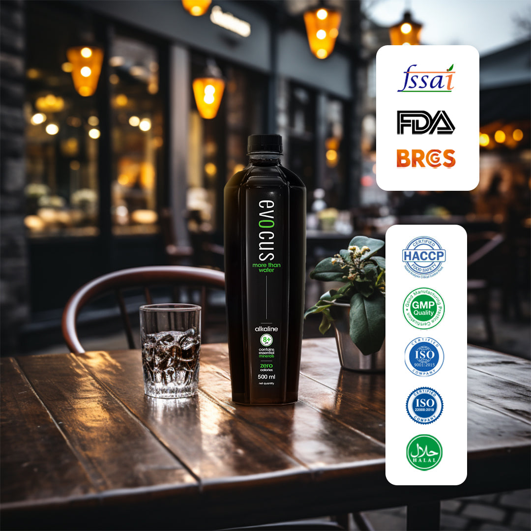 Evocus water bottle on a table with certifications like FDA and ISO.