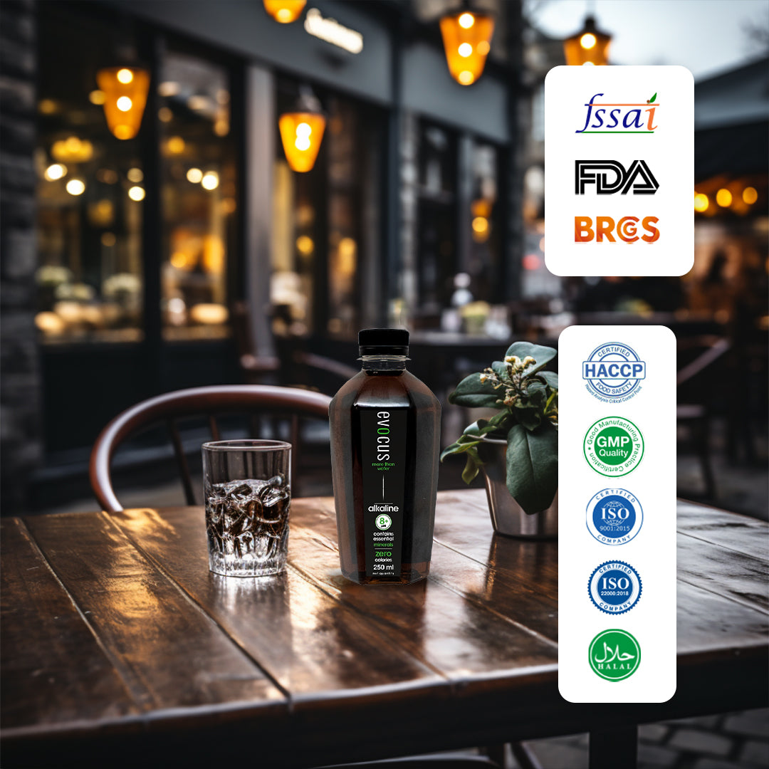 Evocus water bottle on a table with certifications like FDA and ISO.